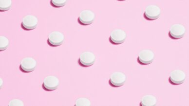 Pills on a pink background