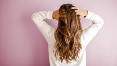 Woman holding her hair