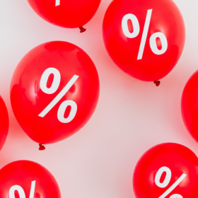 Red balloons with percentage symbols