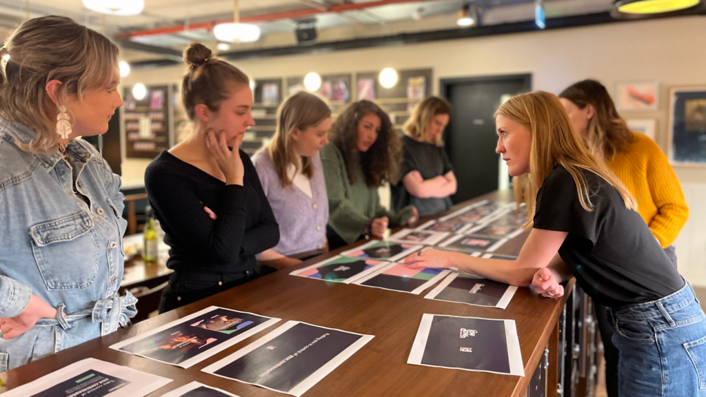 Alice Pelton talking to women in a user feedback session | The Lowdown